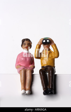 Pensioner looking through Binoculars Stock Photo