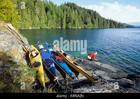 Vancouver Island, Broughton Archipelago, Eden Island, older male kayaker, Vancouver Island, British Columbia, Canada. Stock Photo