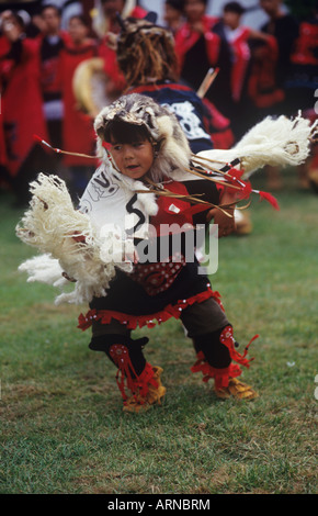 Nass River Valley, Nisga'a boy in regalia dancing, British Columbia, Canada. Stock Photo