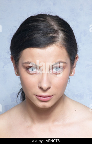 Middle aged woman looking into camera Stock Photo