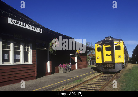 Qualicum Beach, E & N railway station with train arriving, Vancouver Island, British Columbia, Canada. Stock Photo