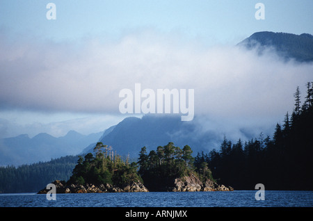 Nootka Sound, near Friendly Cove, layered cloud over islands, Vancouver Island, British Columbia, Canada. Stock Photo