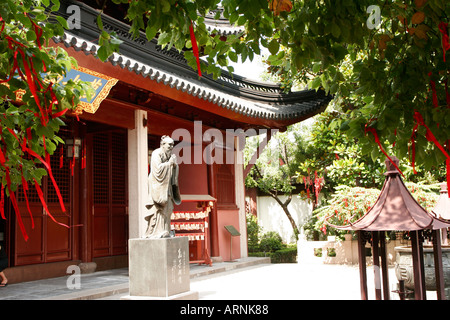 Statue of Confucius and prayer ribbons at the Confucius temple in Shanghai China Stock Photo