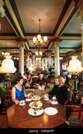 two women having tea at the Empress Hotel, Victoria, Vancouver Island, British Columbia, Canada. Stock Photo