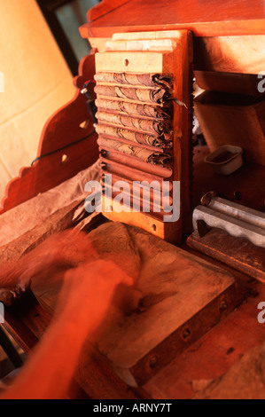 Cuba, Havana, Pantages Cigar factory, blur of hands rolling cigar Stock Photo