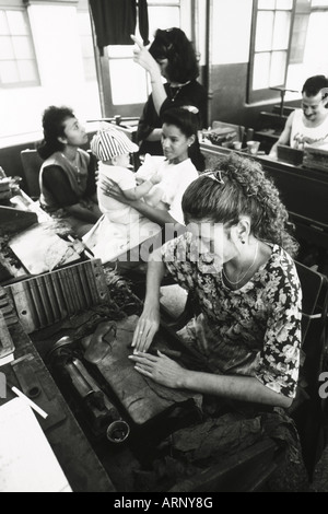 Cuba, Havana, Pantages Cigar factory B&W, cigars and woman with child Stock Photo