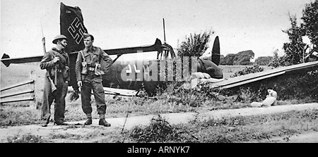 Home Guard on downed German bomber Junkers 88 in the Battle of Britain in 1940 Stock Photo