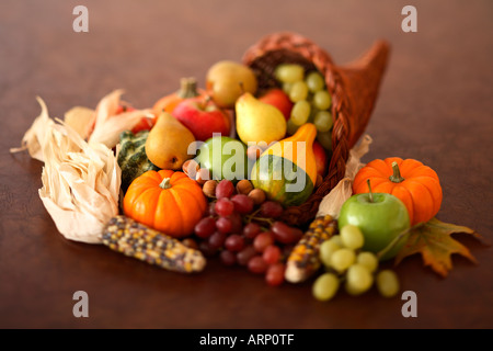 Cornucopia with Fall Gourds, Indian Corn, and Fresh Fruits Stock Photo