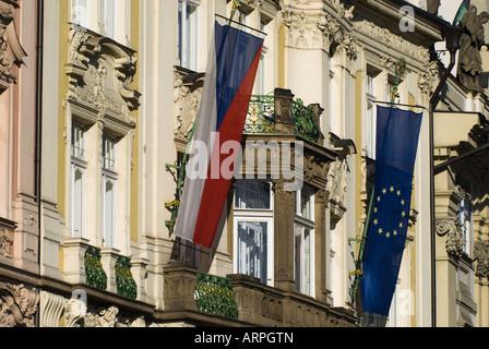 Czech and EU flag flying from buildings in the main square, Prague, Czech Republic Stock Photo