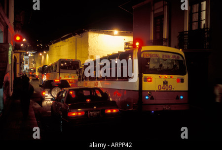 Road Congestion at night in the Old City in Quito Stock Photo