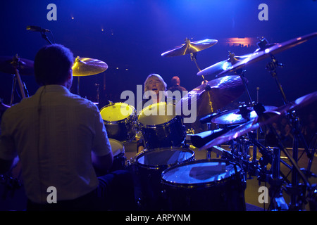 Matt Letley, drummer of the British band 'Status Quo', poses before the ...