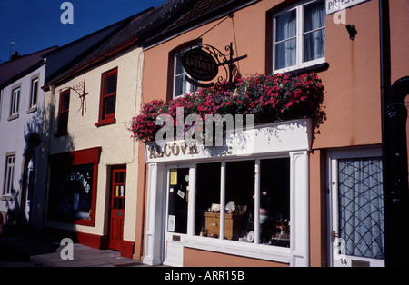 Shops in Priests Row Wells Somerset, England UK Stock Photo