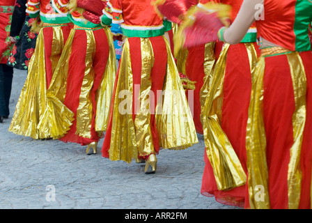Chinese teenage girls dancers performing in the Chinese new year celebration in Albert Square Manchester city Centre UK Europe Stock Photo