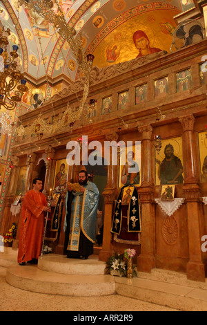 Israel Capernaum by the Sea of Galilee The Greek Orthodox Blessing the Water Ceremony Stock Photo