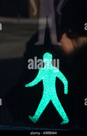 Green man go pedestrian walking traffic light sign photograph Stock ...