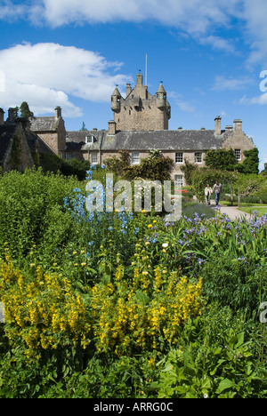dh Cottage garden CAWDOR CASTLE INVERNESSSHIRE Couple walking in gardens flowers path Tower castles sightseers Scotland