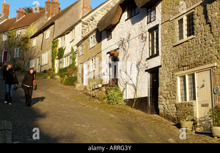 Gold Hill made famous by Hovis Advertisement in Shaftesbury Dorset England Edge of Town Housing Wintertime landscape Stock Photo