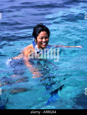 Girl snorkelling at Shiraho Coral Reef, Ishigaki, Okinawa, Japan Stock Photo