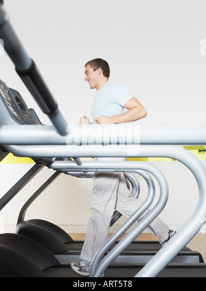 Man on treadmill in health club