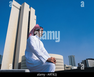 Saudi sitting outside the NCB building in Jeddah, Saudi Arabia Stock Photo