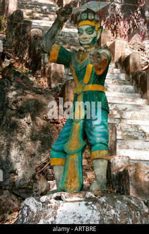 Statue with monkey at a hillside monastery near Moulmein, (Mawlamyaing), Lower Burma, (Myanmar) Stock Photo