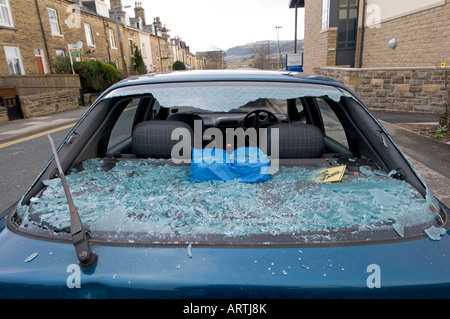 Broken Car window, in residential street, West Yorkshire, Northern England Stock Photo