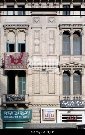 Oriental carpet hanging on balcony railing in Alexandria Egypt Stock Photo