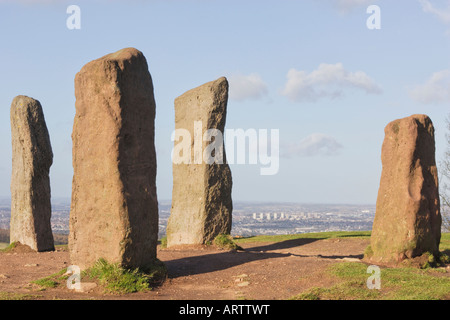 The Four Stones Clent Hills with the towerblocks of Brierley Hill Dudley in the distance. Stock Photo