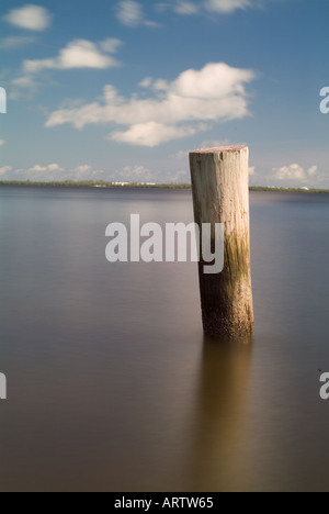 post in water Intracoastal Waterway Jensen Beach Martin County Florida Indian River Lagoon scenic background wood piling Stock Photo