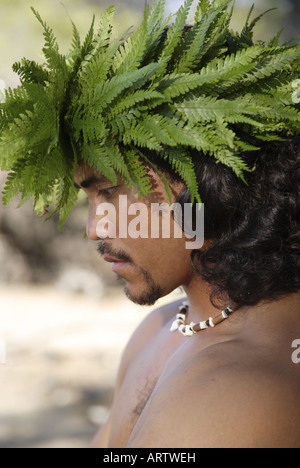 Male (kane) hula dancer deep in thought, wearing palapalai fern head lei, headshot. Stock Photo