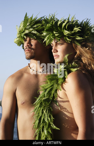 Male (kane) hula dancer deep in thought, wearing palapalai fern head lei, headshot. Stock Photo