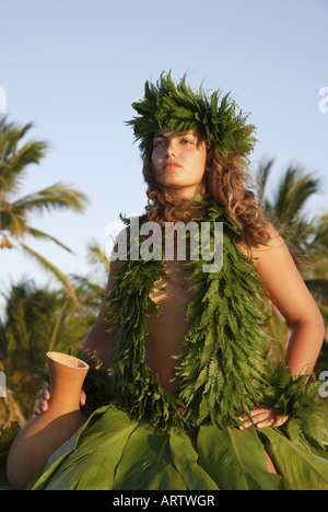 Male (kane) hula dancer deep in thought, wearing palapalai fern head lei, headshot. Stock Photo