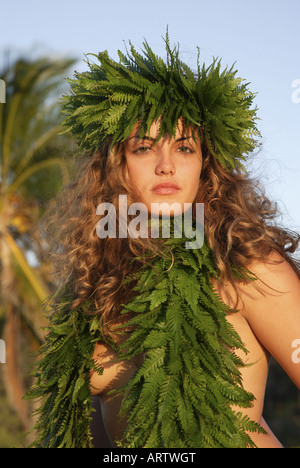 Male (kane) hula dancer deep in thought, wearing palapalai fern head lei, headshot. Stock Photo