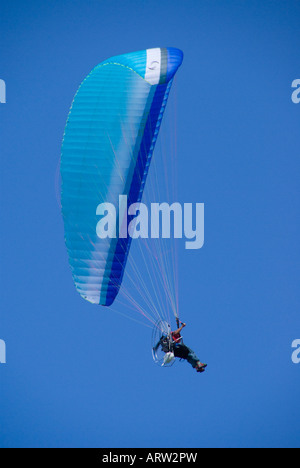 Tenerife aerial sports powered chute flying over Puerto de la Cruz Stock Photo