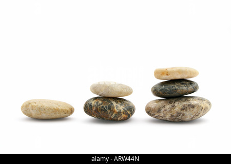Growing piles of stones Stock Photo