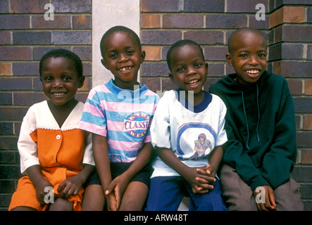 4, four, Zimbabweans, Zimbabwean children, boy, boys, schoolboys, girl, girls, schoolgirls, schoolchildren,Harare, Harare Province, Zimbabwe Stock Photo