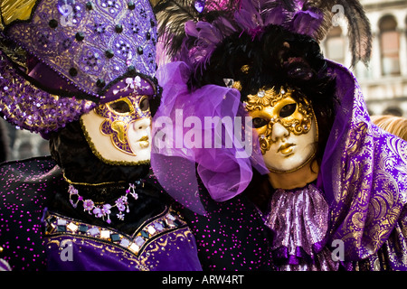 Couple dressed in carnival costume and masks Venice Carnival Veneto Italy Stock Photo