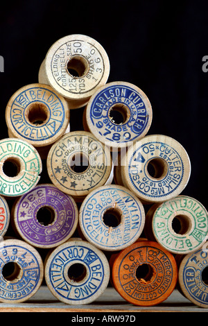 Still Life of Vintage Wooden Spools of Thread and Sewing Notions