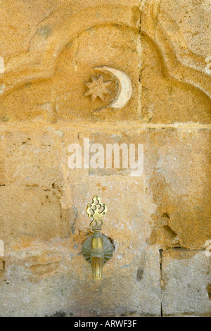 Northern Cyprus, Lefkosa, Arab Ahmet Mosque. Tap outside the mosque used for ritual washing of wudu. Stock Photo