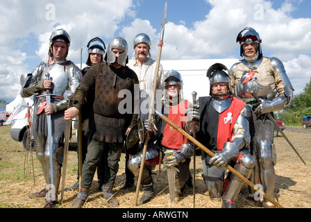Group of Knights from British Plate Armour Society Pose in Full Armour Tewkesbury Medieval Festival Gloucestershire England Stock Photo