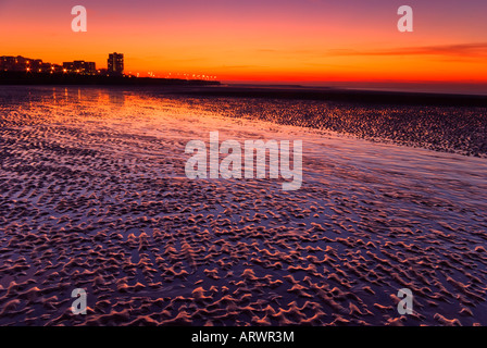 A vibrant sunset at low tide, New Brighton UK GB EU Europe Stock Photo