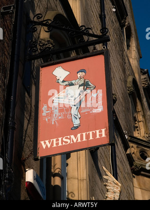 Unusual painted sign for a shop of the WH Smith newsagents chain in Market Place Durham UK Stock Photo
