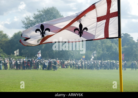 Red and White Heraldric Flag and Distant Knights on Battlefield Renactment Historic Tewkesbury Battle 1471 England 2007 NR Stock Photo