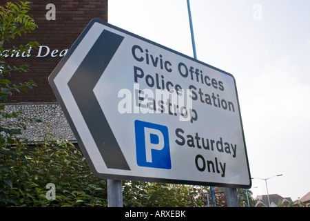 Road signpost at the top of London Road showing directions to Police Station and Council Offices Basingstoke Hampshire Stock Photo