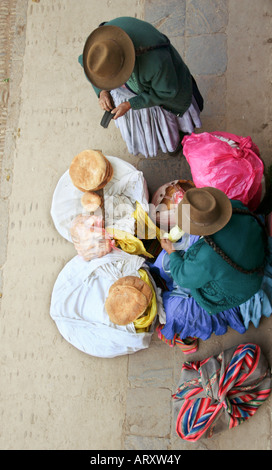 Overhead shot of women selling bread Peru South America Stock Photo