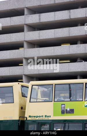 Double decker buses and the multi storey car park in Newport city centre Stock Photo