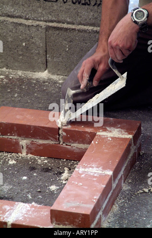 bricklayer brick bricklaying building construction Stock Photo