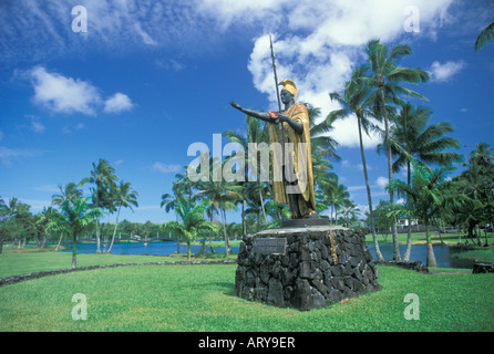 A beautiful statue of King Kamehameha The Great stands majesticaly along King Kamemehameha highway near downtown Hilo. Stock Photo