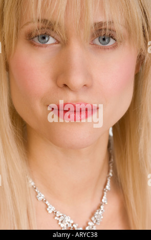 Closeup of woman wearing necklace Stock Photo