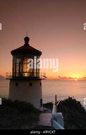 Makapuu pt. lighthouse at sunrise. Located along the southeast coast of oahu. Stock Photo